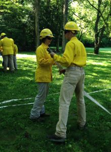 high school summer interns fire camp participate