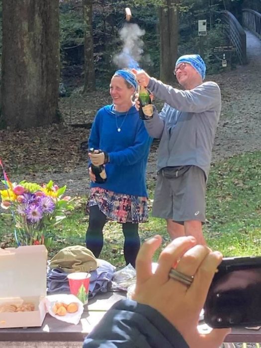 Nancy East and Chris Ford celebrate finishing Tour de Smokies