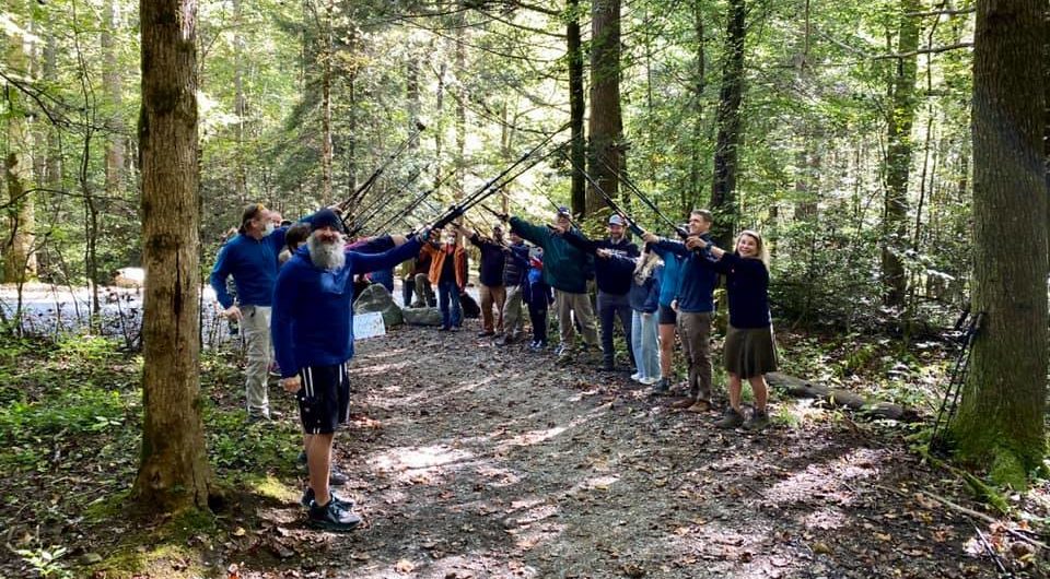 hiking pole archway for Nancy East and Chris Ford