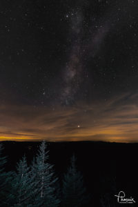 Milky Way over Smokies, taken at Clingsman Dome. Photograph by Phoenix. 20x30 on metal