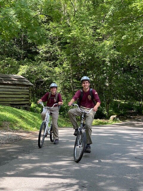 GSMNP high school interns cycling in Cades Cove