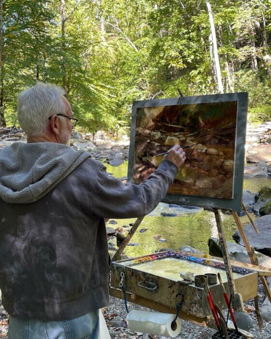 Neal Huges paints at Plein Air in the Smokies 2022