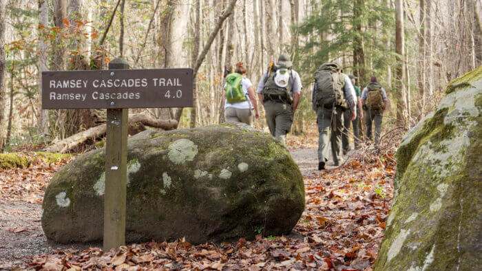 Hikers on Ramsey Cascades Trail