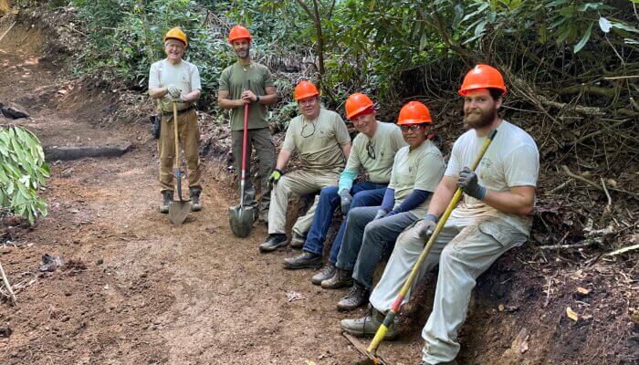 volunteers assist with restoration of Ramsey Cascades Trail