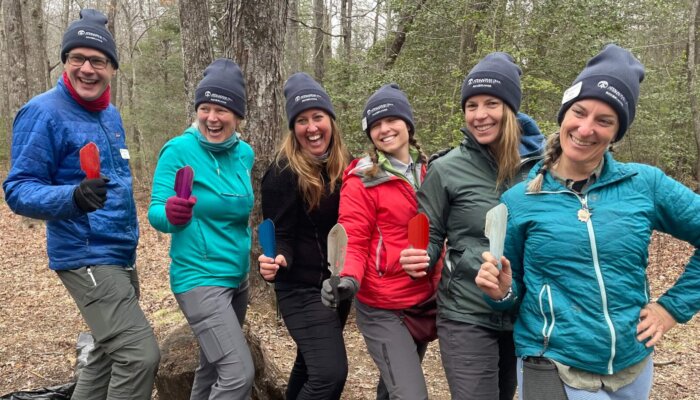 Six Ridgerunners pose holding trowels to be used in digging catholes.